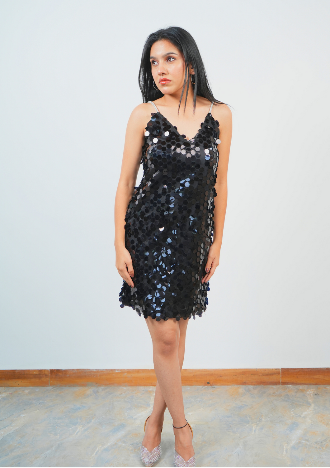 Black chips dress with statement stone-studded sleeves