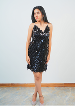 Black chips dress with statement stone-studded sleeves