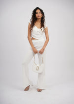 Modern two-piece set with a sleek sleeved top