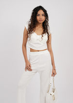 Modern two-piece set with a sleek sleeved top
