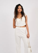 Modern two-piece set with a sleek sleeved top